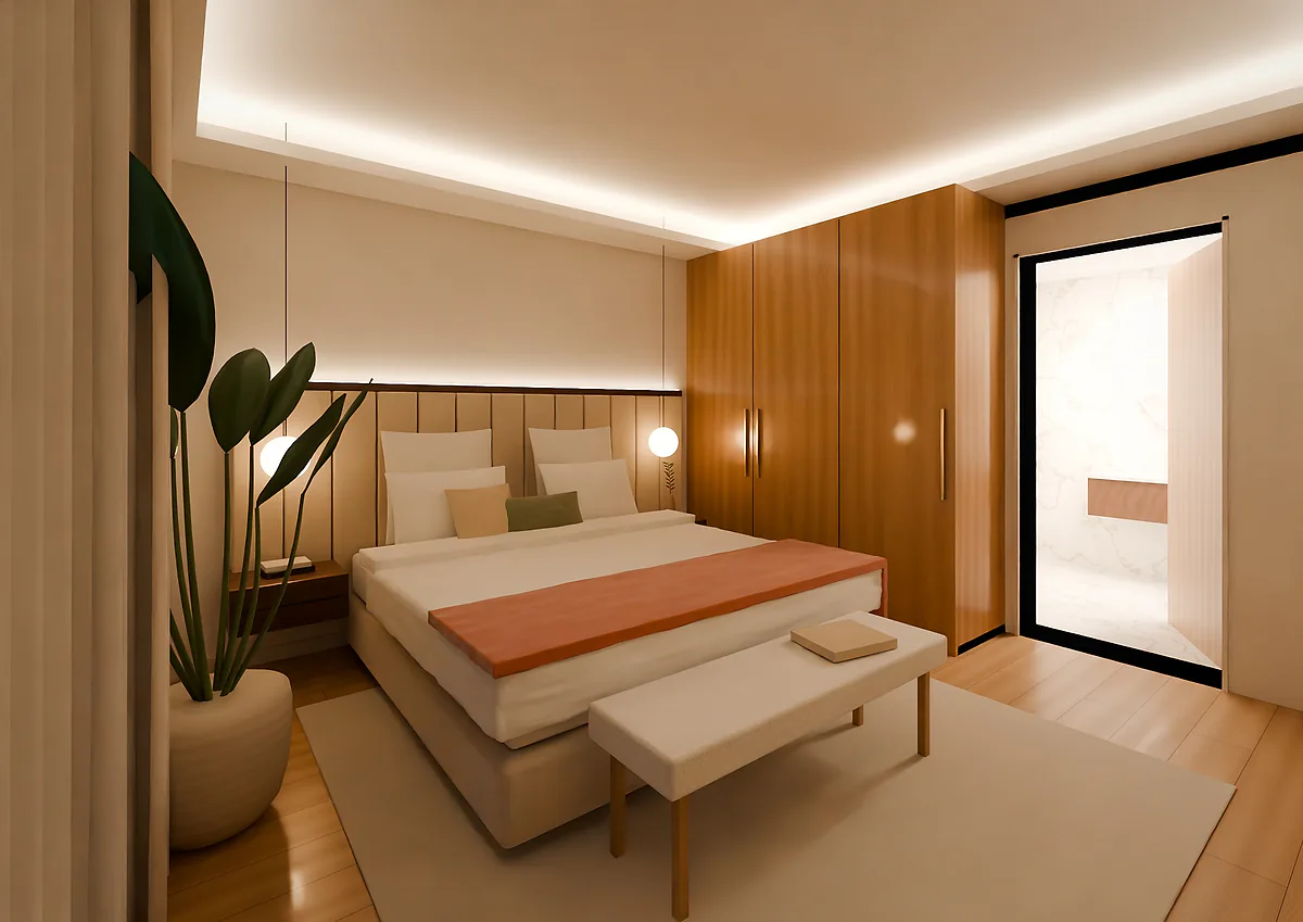 Chambre principale avec tête de lit capitonnée et grands placards